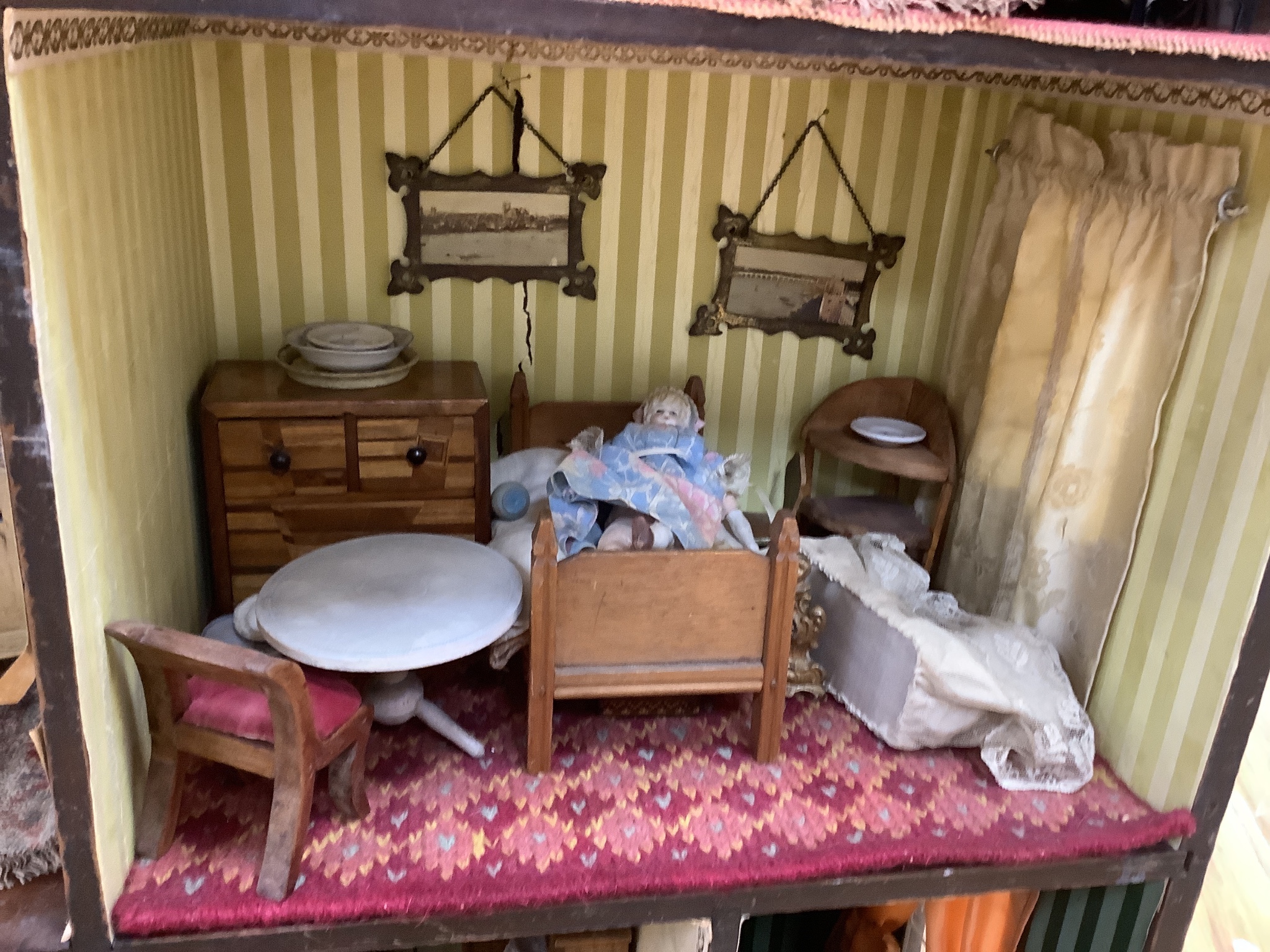 A furnished English dolls’ house, circa 1810-20, 104cm high